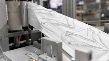 Респіратори FFP-2 на виробництві в Unimatic.